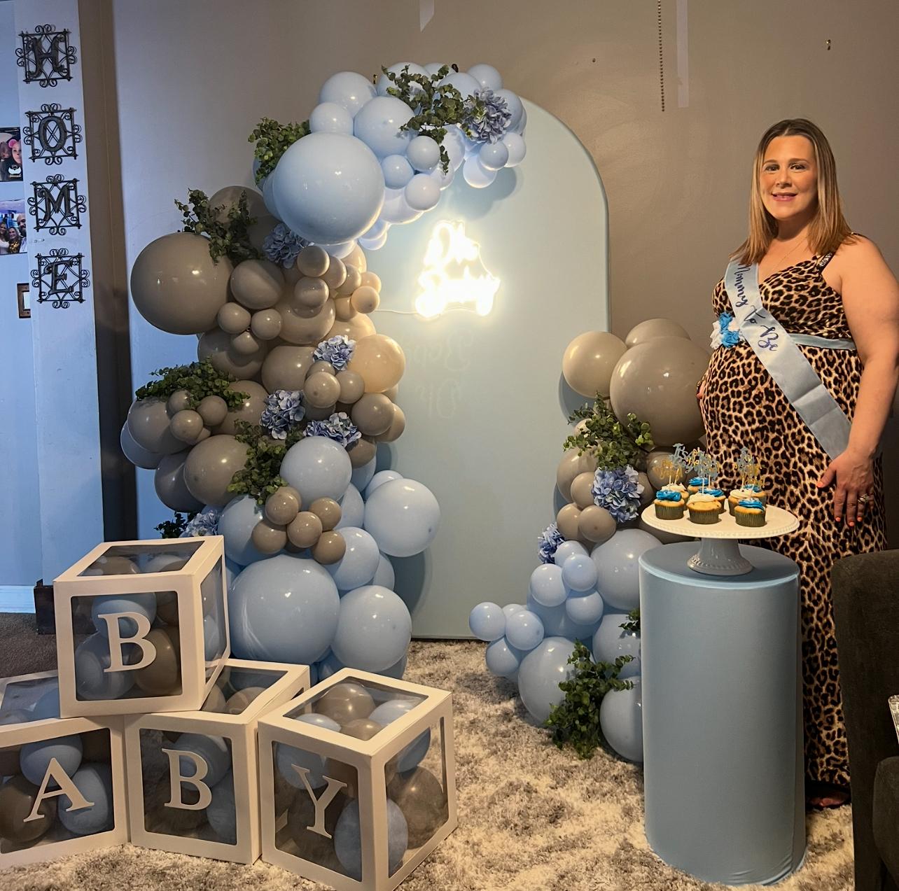 Blue baby shower balloon decor with baby blocks